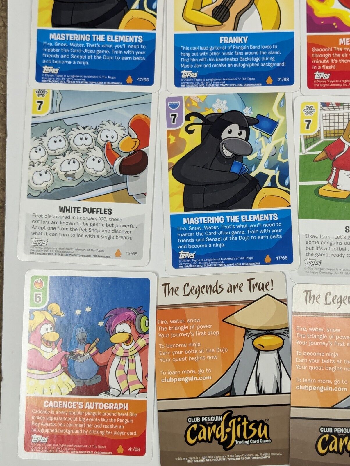 Topps Disney Club Penguin Card-Jitsu 70 Card Lot w/t Foil Cards, Poster & Tins